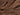 Close-up of smooth, rich chocolate with textured swirls and sprinkled with coarse golden sugar crystals. - AI generated text