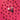 Scattered fresh raspberries on a pink surface, with a wrapped chocolate candy, an unwrapped chocolate showing a raspberry filling, and a square chocolate with chocolate sprinkles in the center. - AI generated text