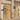 Storefront of Venchi, a chocolate and gelato shop, with large glass windows displaying colorful cones and gold accents, set in a stone building on a city street. - AI generated text