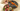A hand holding a pink wrapped chocolate above an open round gift box filled with assorted colorful chocolates. The box has a floral design and an orange ribbon. - AI generated text
