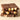 Three Milk Hazelnut Bar Bundle pieces are stacked on a beige surface, each bar containing whole Piedmont hazelnuts. Letters and numbers are embossed on the chocolate squares.